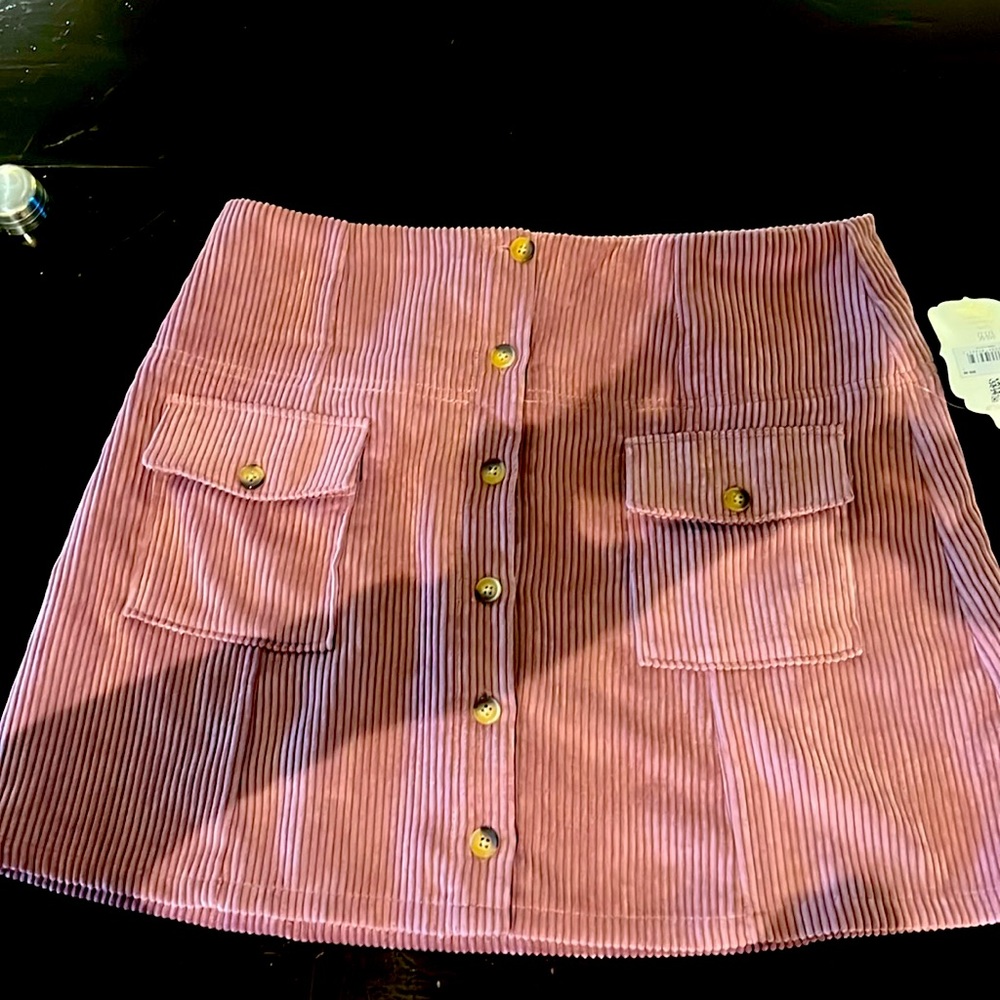 Cranberry corduroy skirt in a size large from alters state, brand new with tags